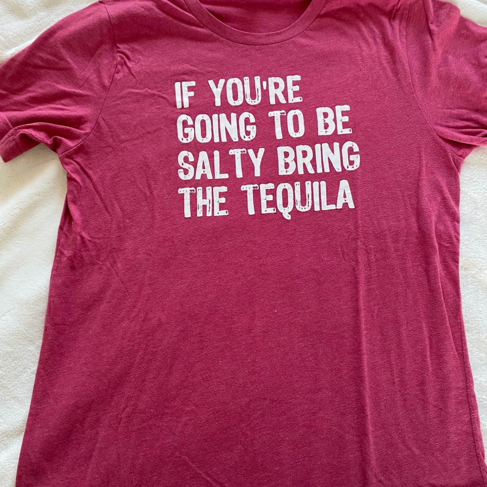 If you’re going to be salty, bring the tequila tee. Dark pink size large.